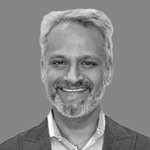 Professional headshot of Rahul Jaggia, Managing Director at UNIDEL, leading AI-driven digital transformation, operational efficiency, and financial services innovation with 27+ years expertise.